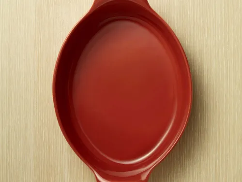 Emile Henry Форма для запекания овальная 34,5 см, цвет: гранат